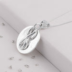 Ashes or Hair Eternal Love Knot Memorial Pendant
