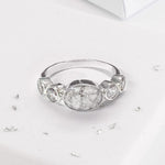 Crystal shoulder oval five stone ashes or hair inlaid ring