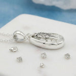 Sterling Silver Mid Size Resin Inlaid Teardrop And Angel Wing Overlay Pendant