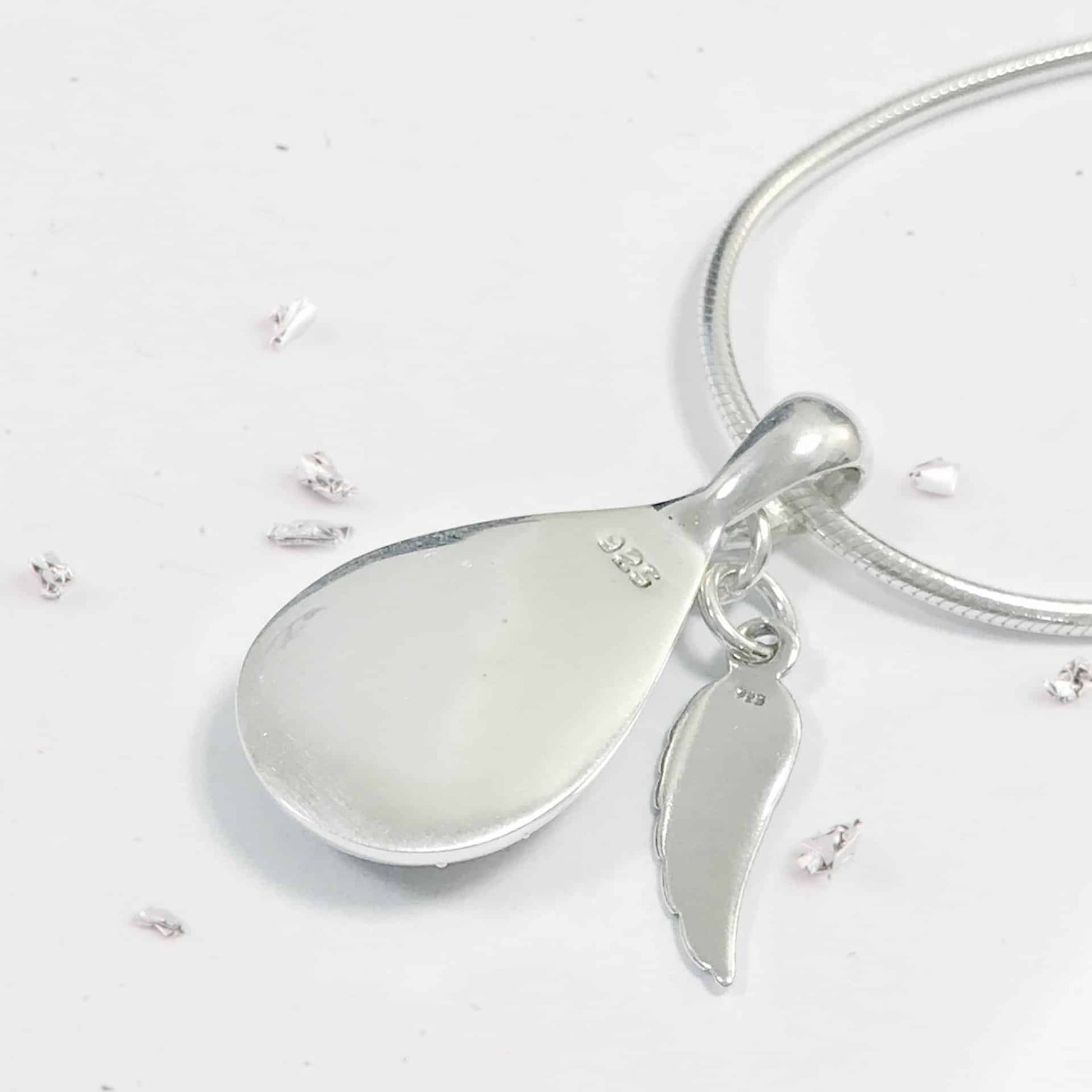 Sterling Silver Mid Size Resin Inlaid Teardrop And Angel Wing Overlay Pendant