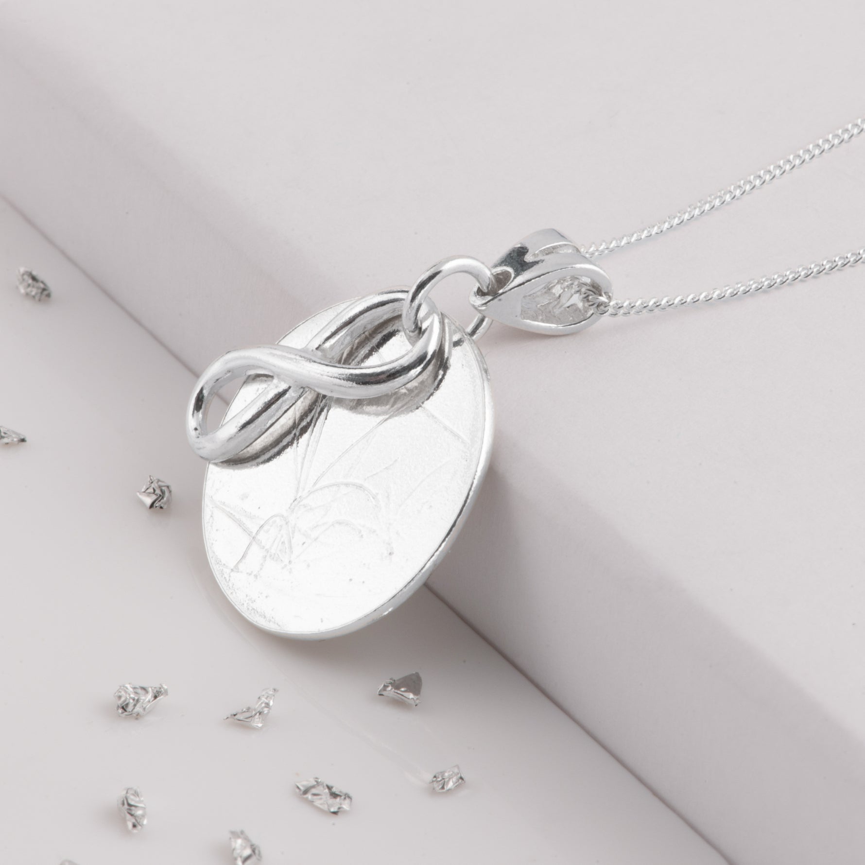 Ashes or Hair Eternal Love Knot Memorial Pendant