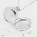 Ashes or hair small round sterling silver locket