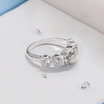 Crystal shoulder oval five stone ashes or hair inlaid ring