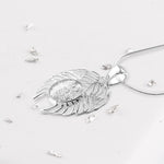 Filigree Angel wing pendant
