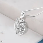 Filigree Angel wing pendant