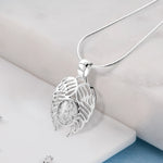 Filigree Angel wing pendant