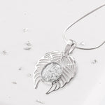 Filigree Angel wing pendant
