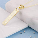 Gold Imprinted Oblong Bar Pendant