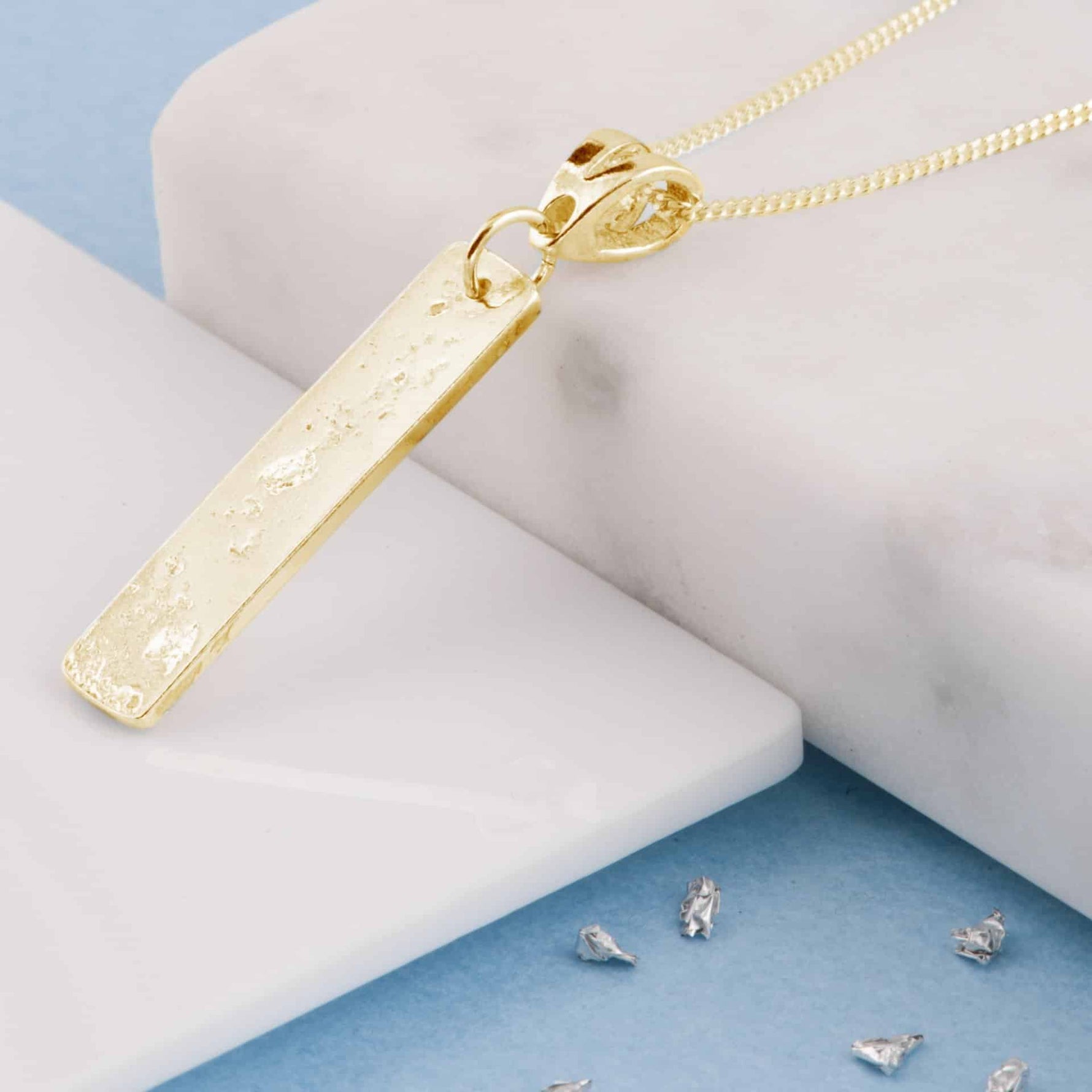 Gold Imprinted Oblong Bar Pendant