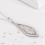 Large teardrop shaped ashes or hair crystal pendant