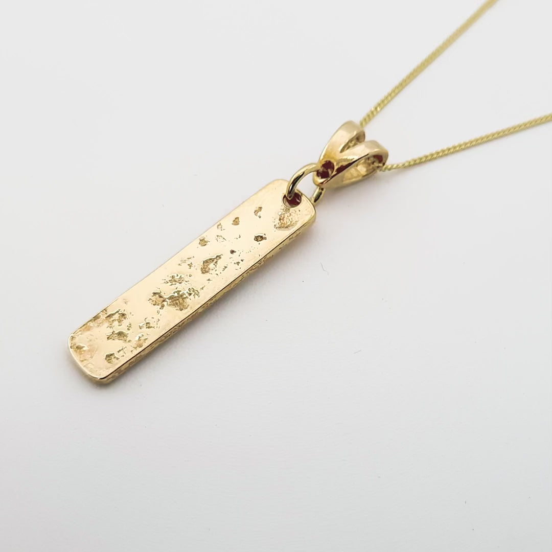 Gold Imprinted Oblong Bar Pendant