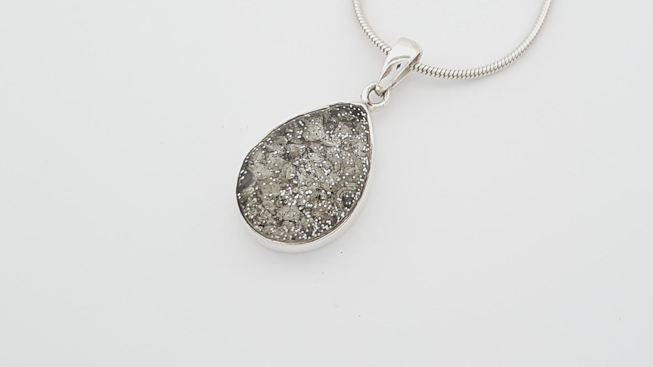 ashes teardrop pendant video on white background