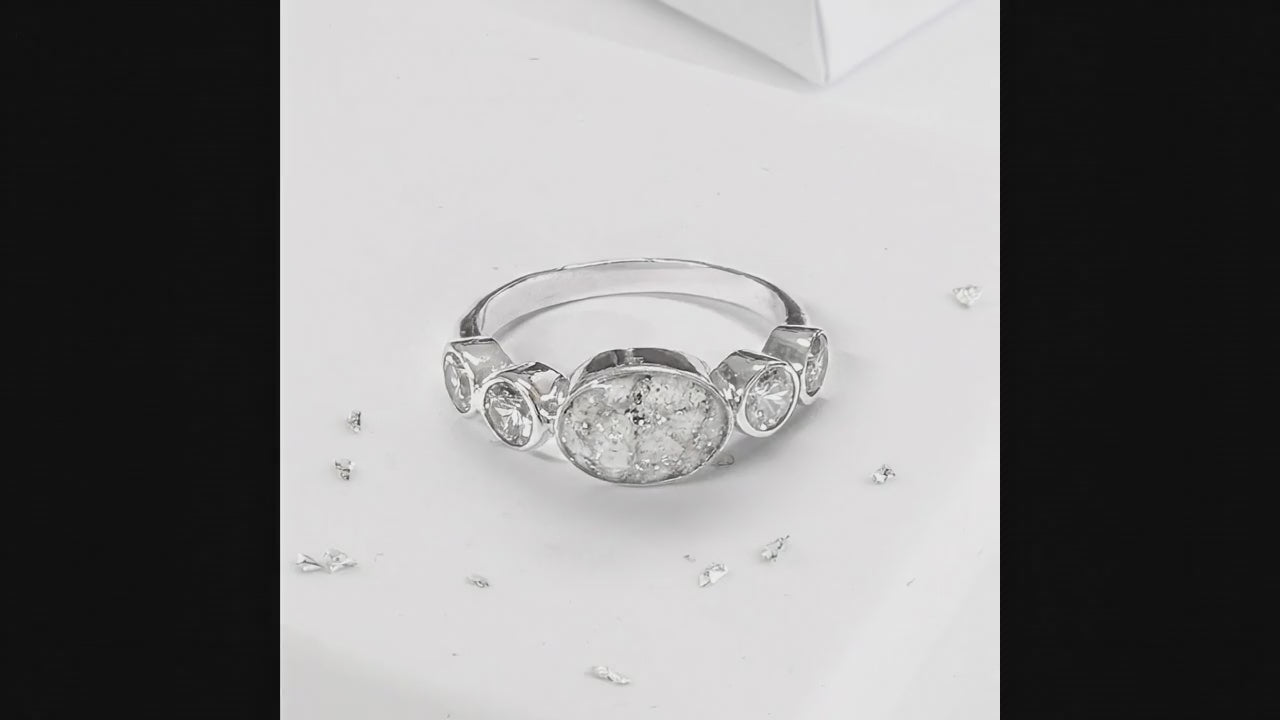 Crystal shoulder oval five stone ashes or hair inlaid ring