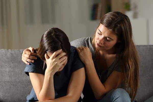 Women Being Comforted