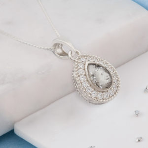 Small teardrop shaped ashes or hair crystal pendant